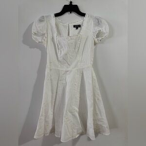 Cut white dress with yellow flowers Sequin hearts brand. never worn size small